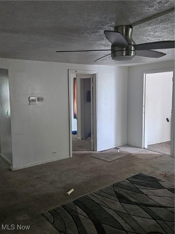 6270 Fairview Rd, Austintown, OH 44515 - carpeted empty room with a ceiling fan and a textured ceiling