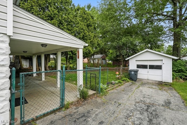447 Allenford St, Akron, OH 44314 - detached garage with a gate and asphalt driveway