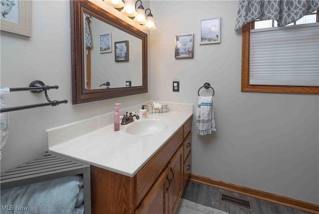 937 Amundsen Dr, Canal Fulton, OH 44614 - bathroom with vanity and wood finished floors