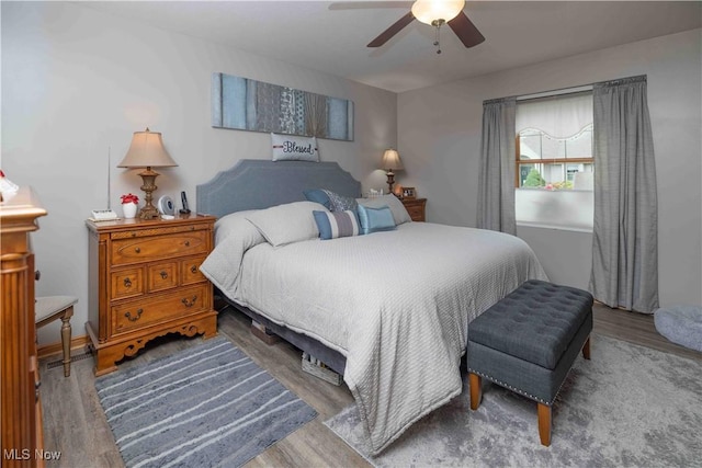 937 Amundsen Dr, Canal Fulton, OH 44614 - bedroom with wood finished floors and ceiling fan