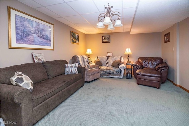 937 Amundsen Dr, Canal Fulton, OH 44614 - living area with a chandelier, carpet, and a drop ceiling