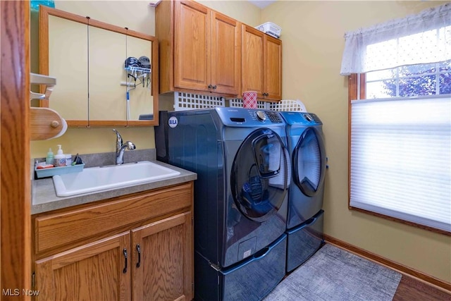 937 Amundsen Dr, Canal Fulton, OH 44614 - laundry room with washer and dryer and cabinet space