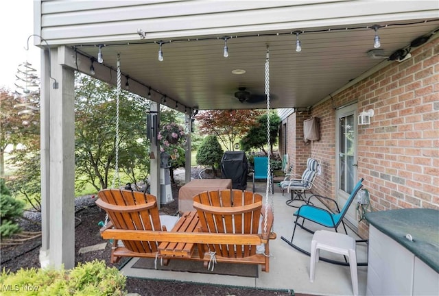 937 Amundsen Dr, Canal Fulton, OH 44614 - view of patio with a ceiling fan and a grill