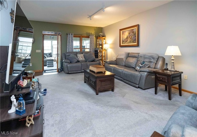 937 Amundsen Dr, Canal Fulton, OH 44614 - living room with track lighting and carpet flooring