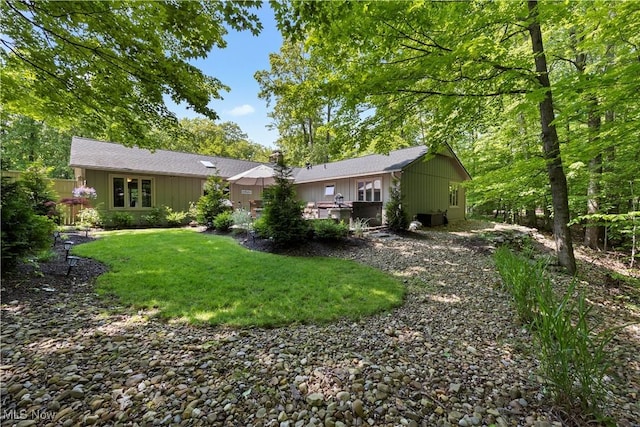 12145 The Blfs, Strongsville, OH 44136 - rear view of house with a yard