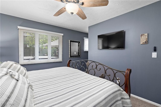 12145 The Blfs, Strongsville, OH 44136 - carpeted bedroom with baseboards and ceiling fan