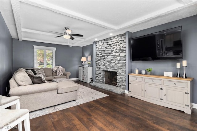 12145 The Blfs, Strongsville, OH 44136 - living room with dark wood-style floors, a ceiling fan, a fireplace, recessed lighting, and beam ceiling