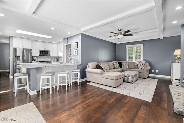 12145 The Blfs, Strongsville, OH 44136 - living room featuring ceiling fan, recessed lighting, dark wood-style floors, and beam ceiling