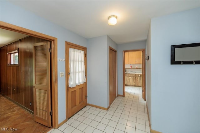 2375 Glendon Rd, University Heights, OH 44118 - corridor featuring baseboards and light tile patterned floors