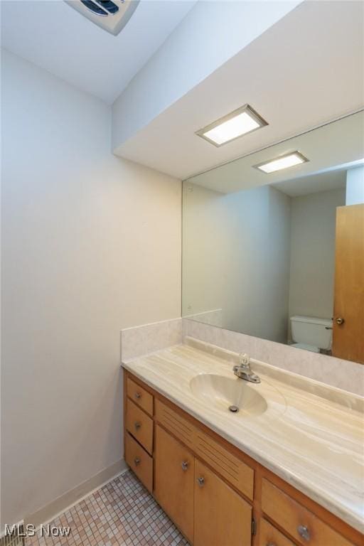 2375 Glendon Rd, University Heights, OH 44118 - half bathroom with vanity and toilet