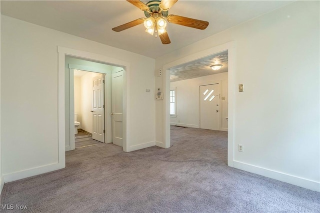 996 Peerless Ave, Akron, OH 44320 - carpeted spare room featuring a ceiling fan and baseboards