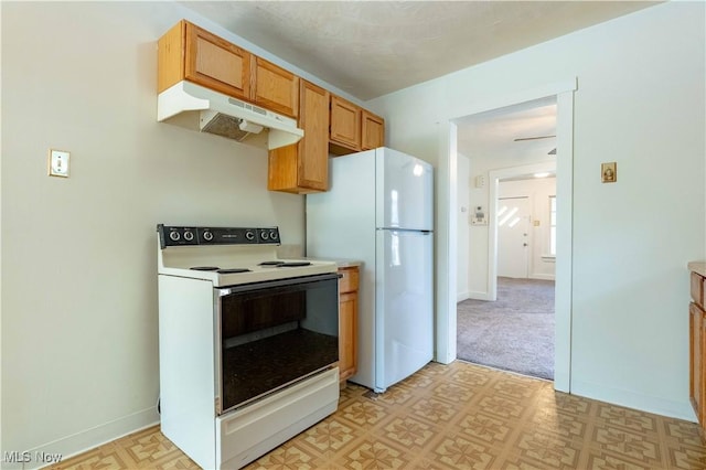996 Peerless Ave, Akron, OH 44320 - kitchen featuring white appliances, under cabinet range hood, light countertops, and light flooring