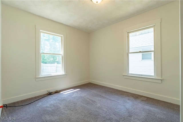 996 Peerless Ave, Akron, OH 44320 - unfurnished room with carpet and baseboards