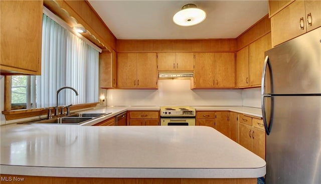 1592 Pleasant Vw, Dover, OH 44612 - kitchen with stainless steel appliances, under cabinet range hood, light countertops, and a peninsula