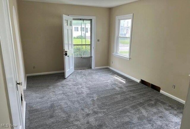 920 Washington Ave, Girard, OH 44420 - spare room with carpet floors