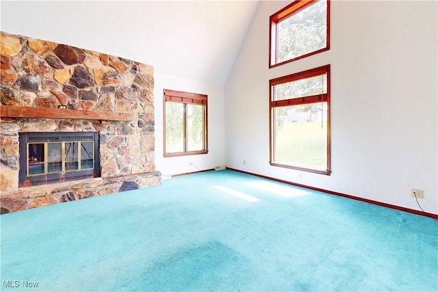 5864 State Route 213, Toronto, OH 43964 - unfurnished living room featuring high vaulted ceiling, a stone fireplace, and carpet
