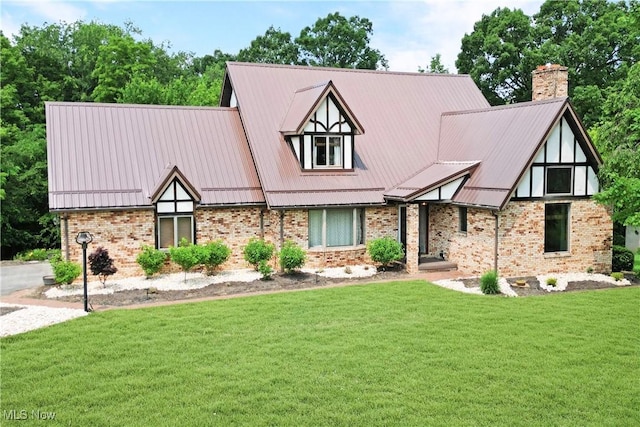 5864 State Route 213, Toronto, OH 43964 - tudor house with a front lawn, brick siding, and a chimney