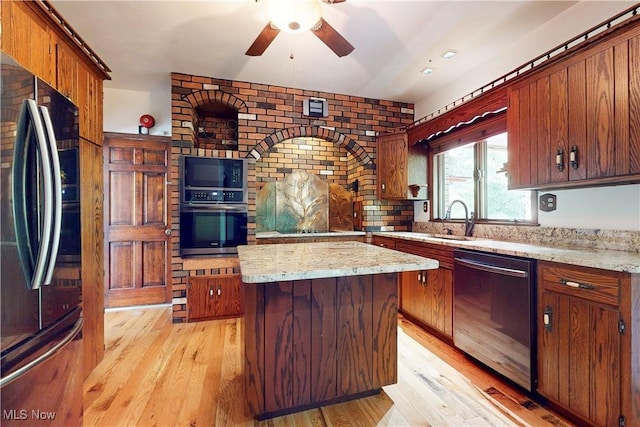 5864 State Route 213, Toronto, OH 43964 - kitchen featuring black appliances, light wood finished floors, ceiling fan, a kitchen island, and light stone countertops
