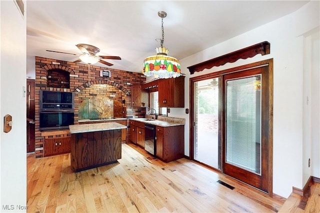 5864 State Route 213, Toronto, OH 43964 - kitchen with black dishwasher, light wood-type flooring, decorative light fixtures, and ceiling fan