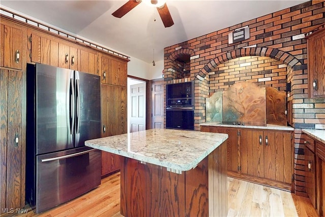5864 State Route 213, Toronto, OH 43964 - kitchen featuring black appliances, brown cabinets, and light wood finished floors
