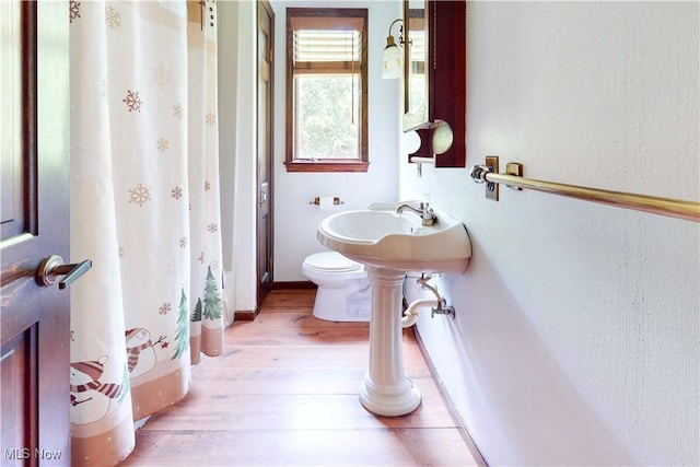 5864 State Route 213, Toronto, OH 43964 - full bath with wood finished floors and curtained shower