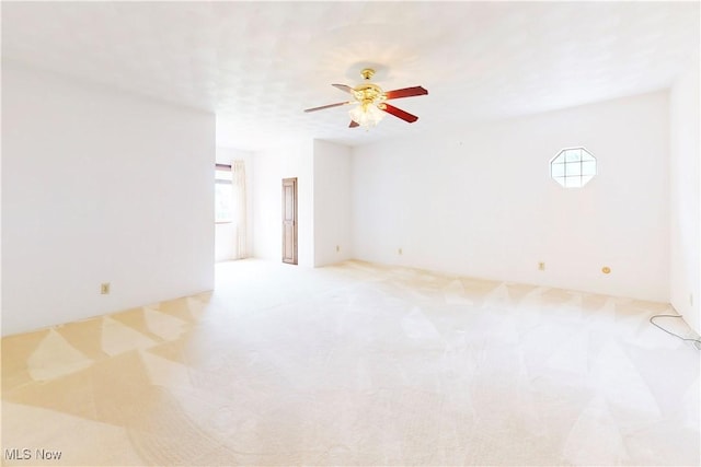 5864 State Route 213, Toronto, OH 43964 - unfurnished room with light carpet and a ceiling fan