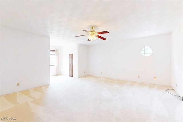 5864 State Route 213, Toronto, OH 43964 - spare room featuring light carpet and a ceiling fan