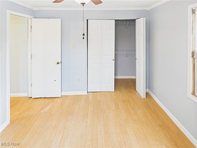 1317 Crescent St, Parkersburg, WV 26101 - unfurnished bedroom with a closet, light wood-style floors, ornamental molding, and ceiling fan