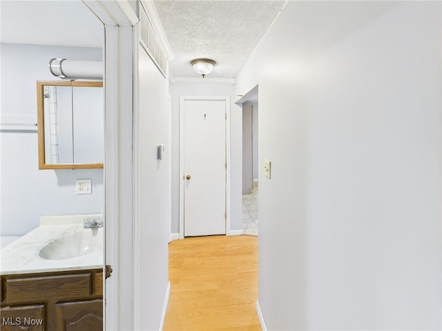 1317 Crescent St, Parkersburg, WV 26101 - hallway with wood finished floors and a textured ceiling