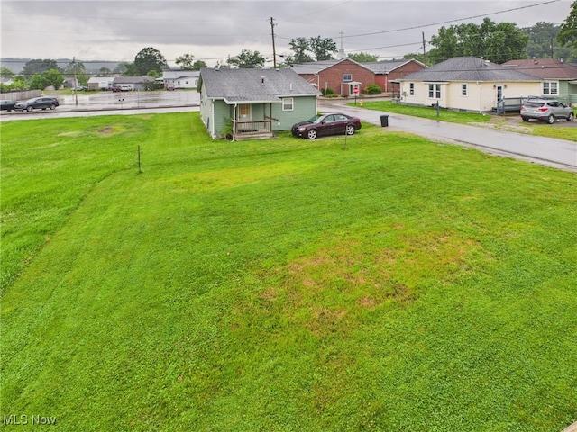 1317 Crescent St, Parkersburg, WV 26101 - view of yard with driveway and a residential view