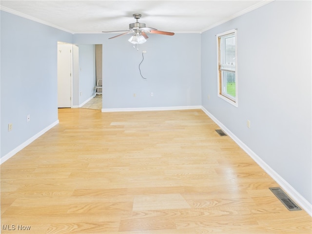 1317 Crescent St, Parkersburg, WV 26101 - unfurnished room featuring ceiling fan, ornamental molding, and light wood finished floors