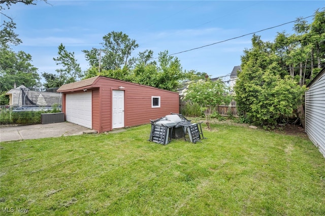 4532 W 172nd St, Cleveland, OH 44135 - view of yard with a detached garage, an outdoor structure, and driveway