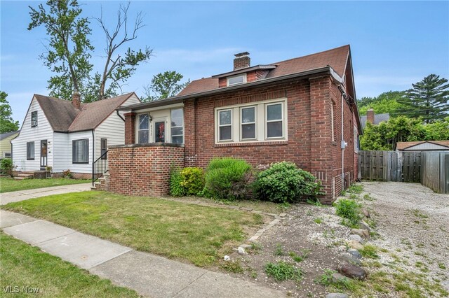 4532 W 172nd St, Cleveland, OH 44135 - bungalow-style house featuring brick siding and a chimney