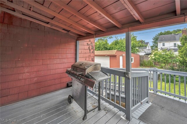 4532 W 172nd St, Cleveland, OH 44135 - deck featuring area for grilling and an outbuilding