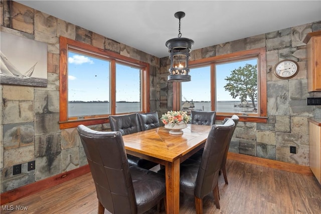731 Cedar Point Rd, Sandusky, OH 44870 - dining area with healthy amount of natural light and wood finished floors
