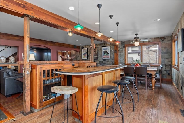 731 Cedar Point Rd, Sandusky, OH 44870 - indoor wet bar with wood finished floors, a ceiling fan, beamed ceiling, decorative light fixtures, and recessed lighting