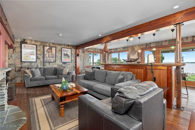 731 Cedar Point Rd, Sandusky, OH 44870 - living area featuring hardwood / wood-style flooring, plenty of natural light, recessed lighting, beamed ceiling, and wooden walls