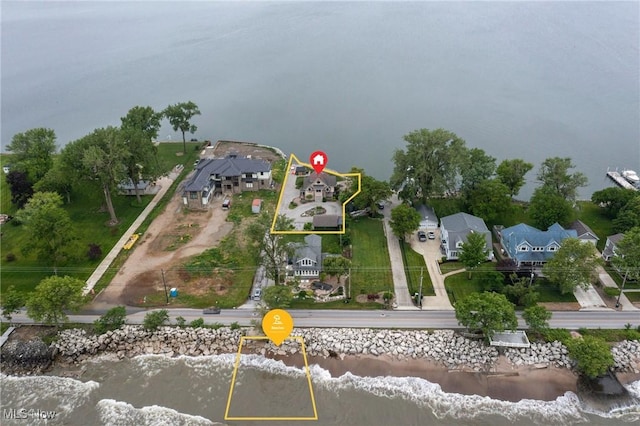 731 Cedar Point Rd, Sandusky, OH 44870 - aerial perspective of suburban area with property parcel outlined and a large body of water