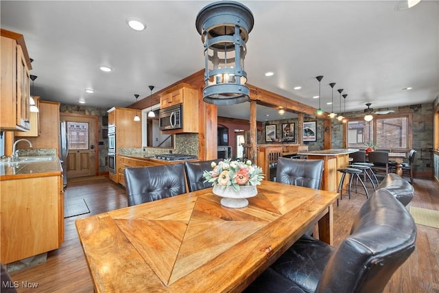 731 Cedar Point Rd, Sandusky, OH 44870 - dining room featuring a ceiling fan, dark wood-style floors, and recessed lighting