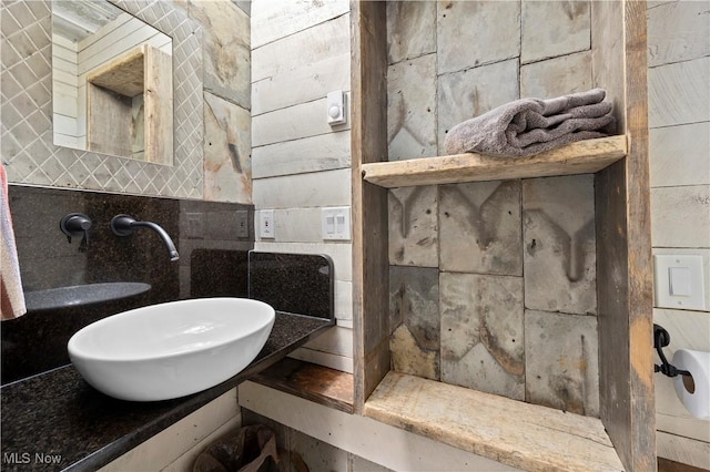731 Cedar Point Rd, Sandusky, OH 44870 - bathroom featuring a sink and tasteful backsplash