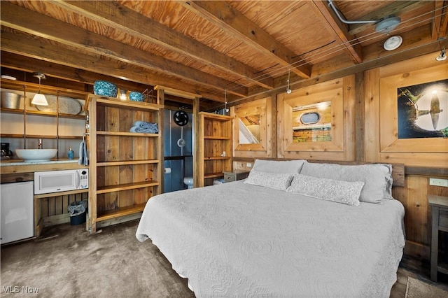 731 Cedar Point Rd, Sandusky, OH 44870 - bedroom with refrigerator, wood walls, and wooden ceiling
