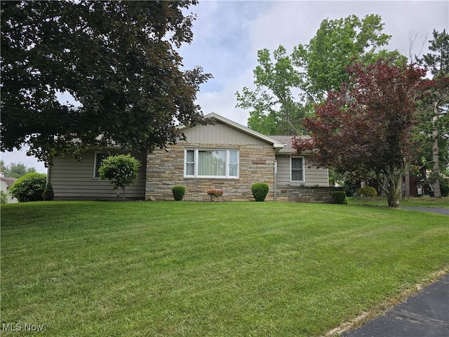 36277 Butcher Rd, Salem, OH 44460 - view of front of home with stone siding and a front yard