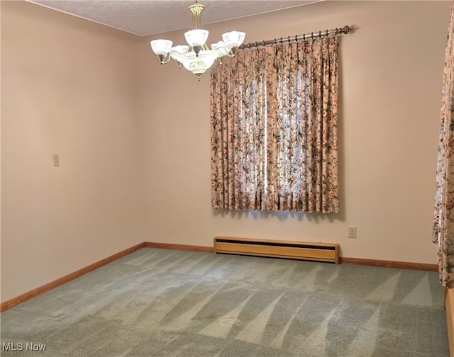 36277 Butcher Rd, Salem, OH 44460 - spare room with a baseboard heating unit, carpet floors, a chandelier, and a textured ceiling