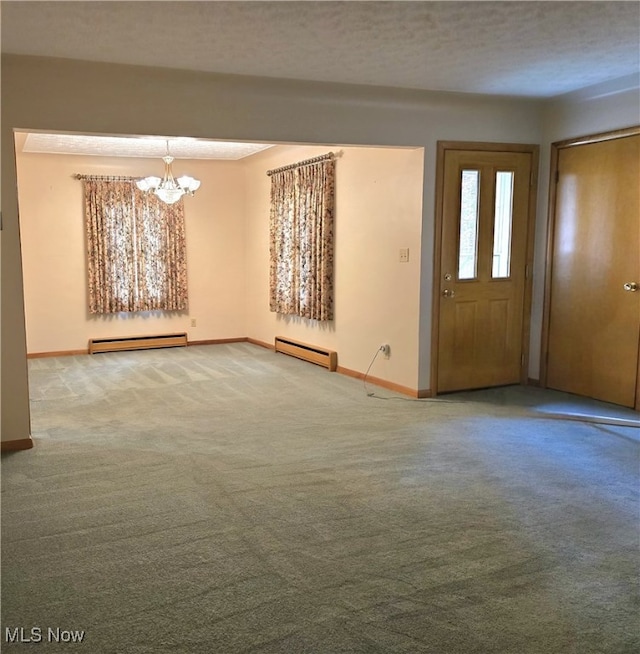 36277 Butcher Rd, Salem, OH 44460 - foyer entrance featuring a baseboard radiator, a chandelier, and carpet floors