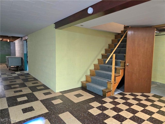 36277 Butcher Rd, Salem, OH 44460 - finished below grade area with concrete block wall, stairway, and tile patterned floors