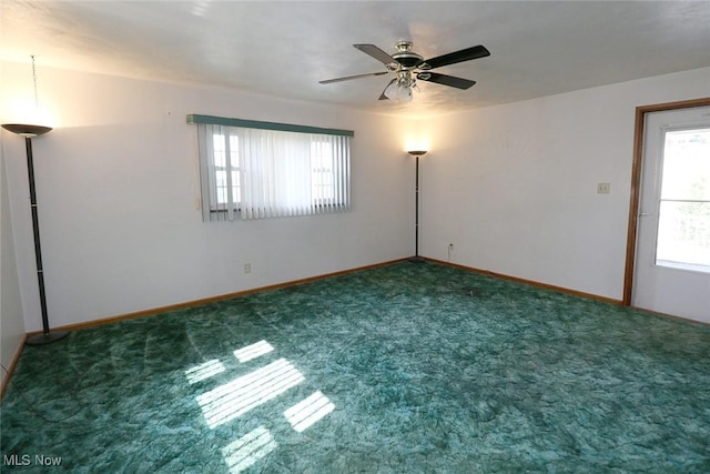 417 Logan Ave, Mingo Junction, OH 43938 - spare room featuring healthy amount of natural light, carpet floors, and ceiling fan