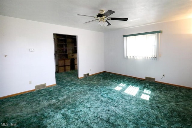 417 Logan Ave, Mingo Junction, OH 43938 - spare room featuring a ceiling fan and carpet floors