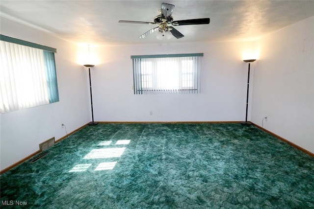 417 Logan Ave, Mingo Junction, OH 43938 - carpeted empty room featuring a ceiling fan and baseboards