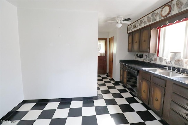 417 Logan Ave, Mingo Junction, OH 43938 - kitchen featuring tile patterned floors, dishwasher, dark countertops, and a ceiling fan