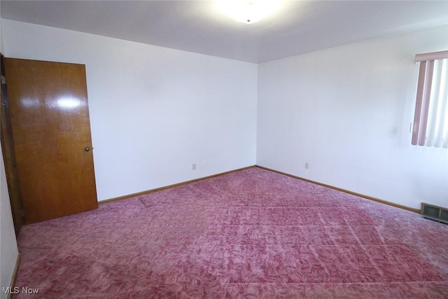 417 Logan Ave, Mingo Junction, OH 43938 - empty room featuring carpet floors and baseboards